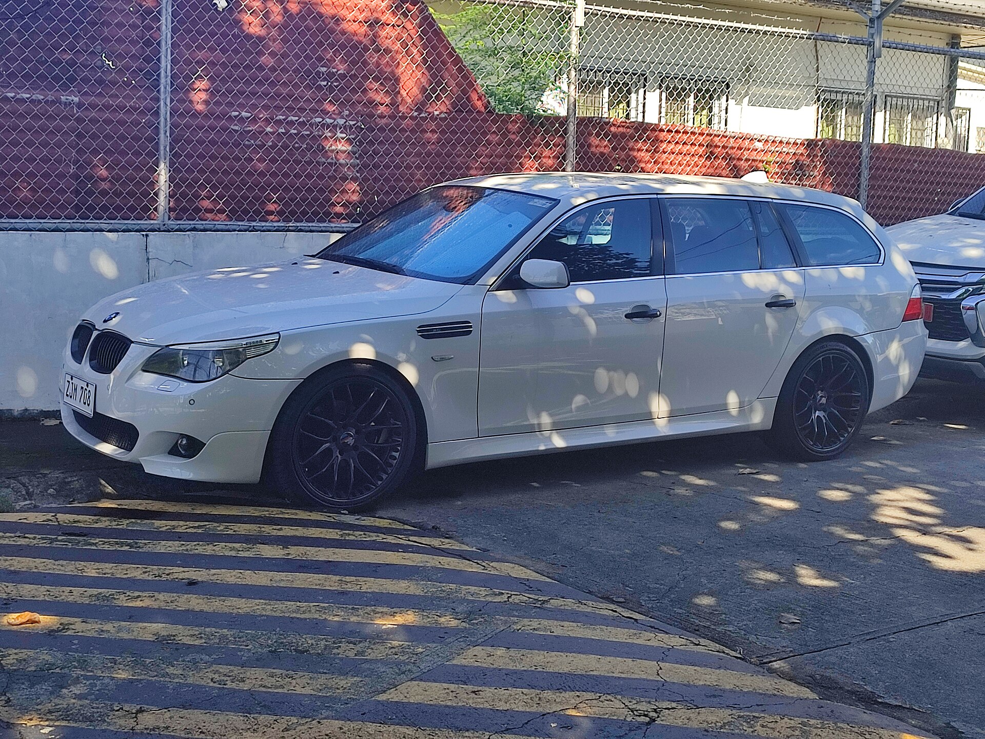 M5 E61 Touring in a real licensed photograph