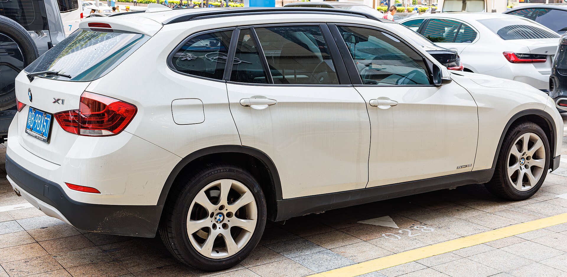 X1 E84 Sports Activity Vehicle in a real licensed photograph